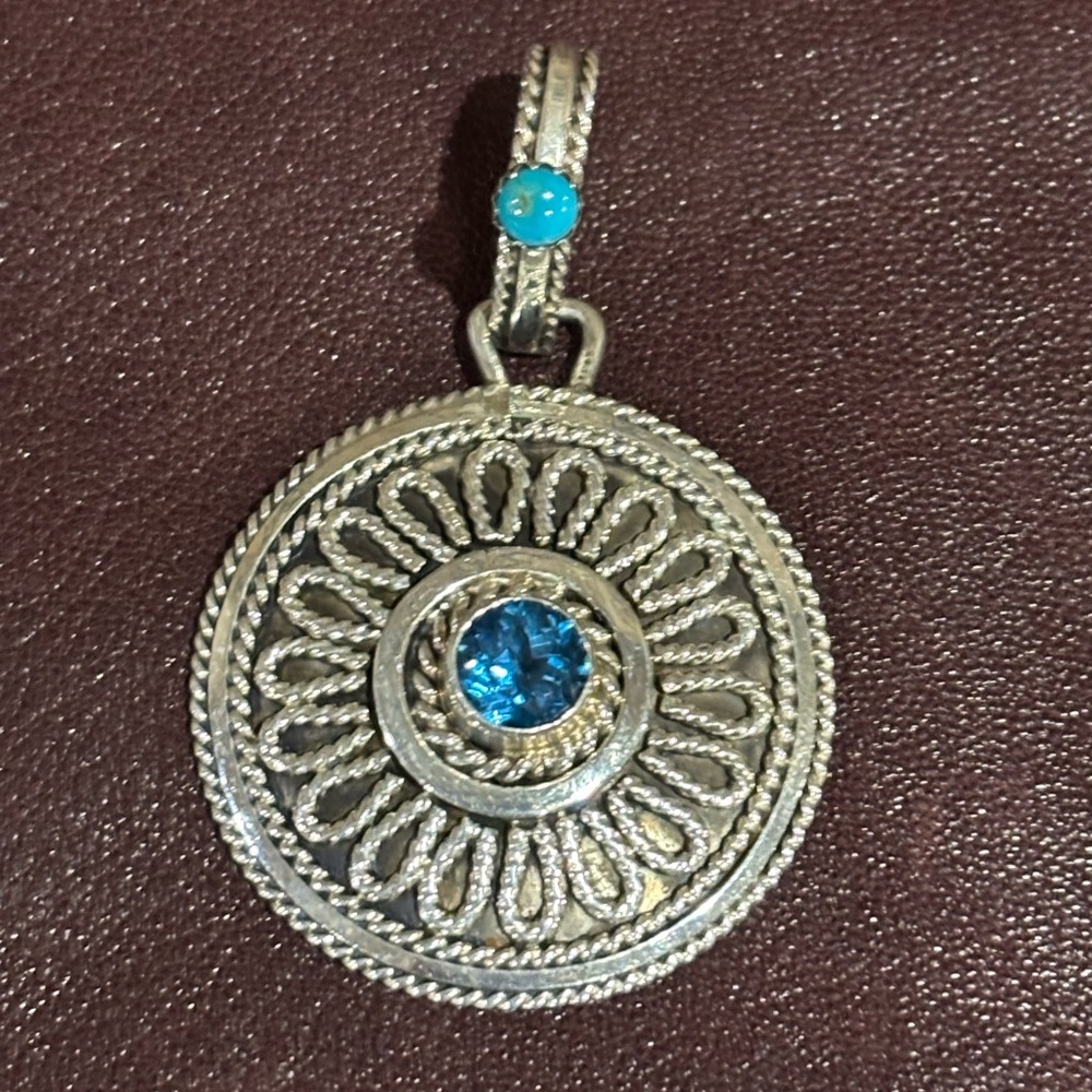 Signed Running Bear pendant